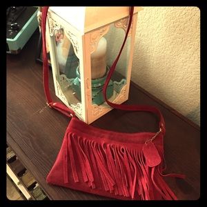 Maroon suede crossbody purse with fringe